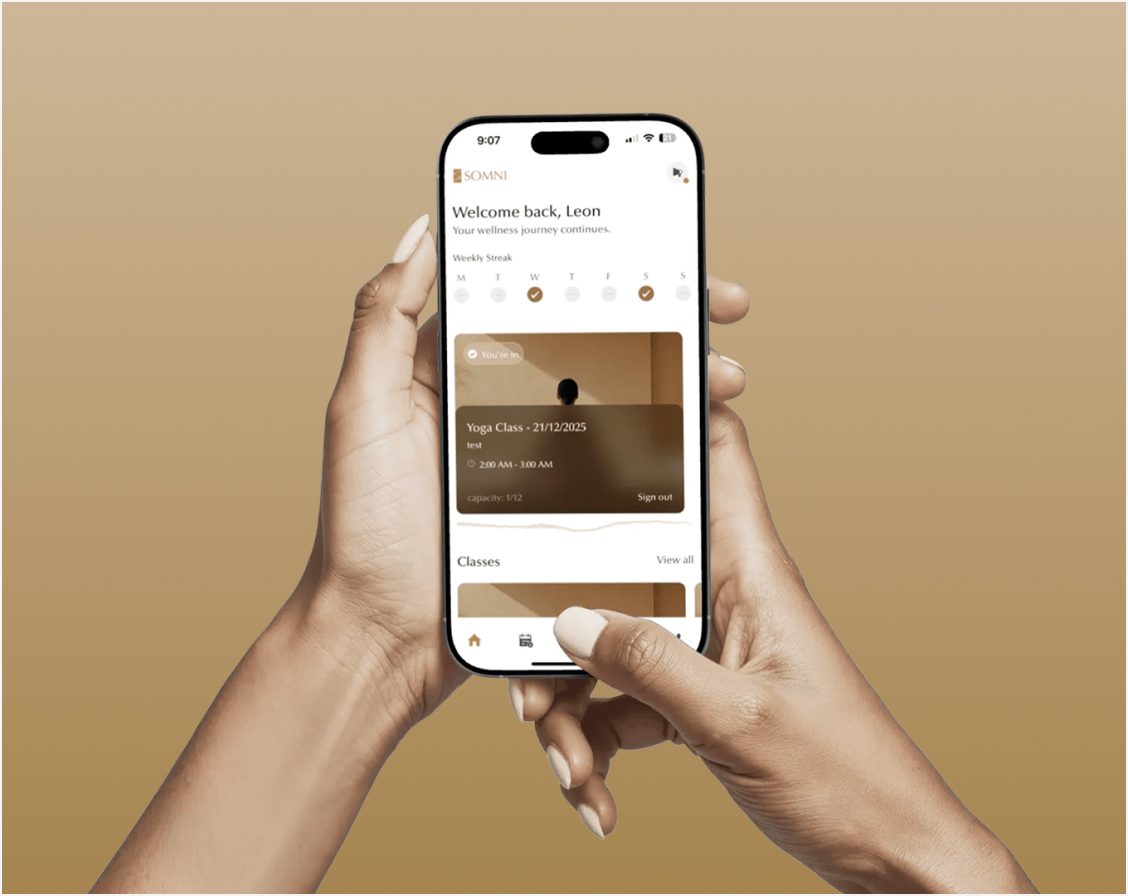 Somni spa and wellness app on a phone
