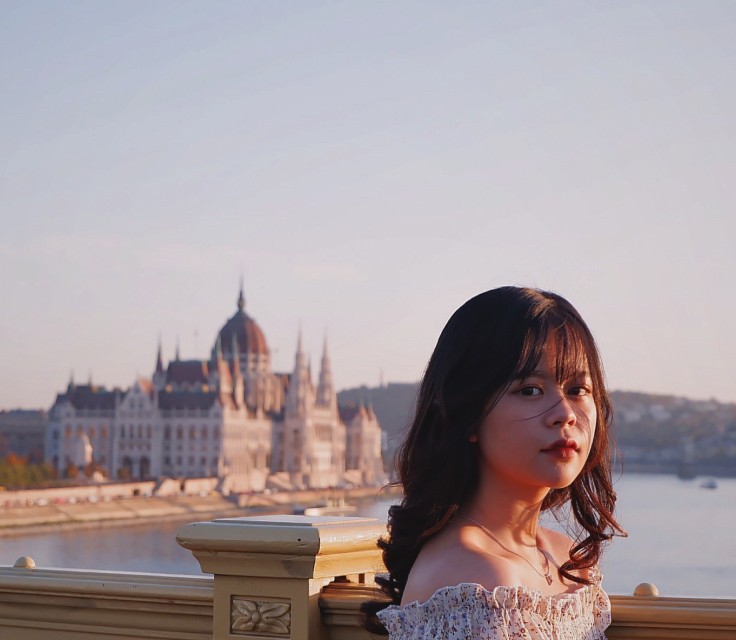 Helena in front of the Hungarian Parliament, Budapest, 2019