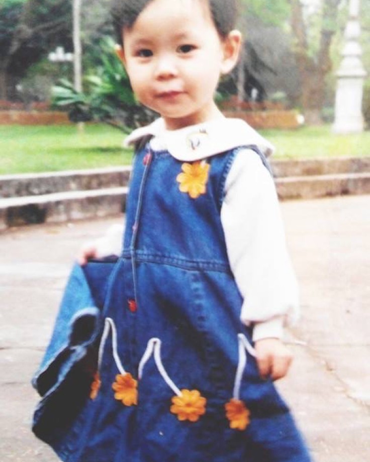 Helena as a toddler in a denim dress, 2003